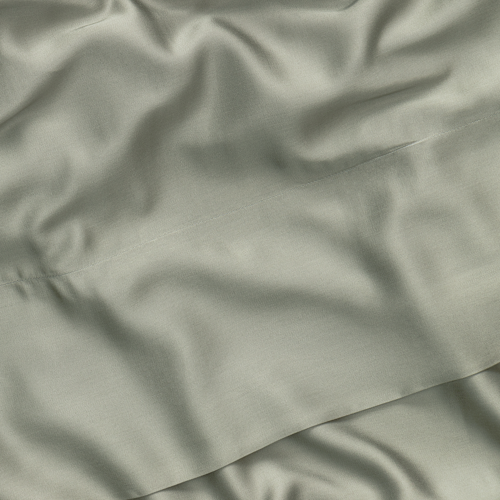 Close up of sage bedding 