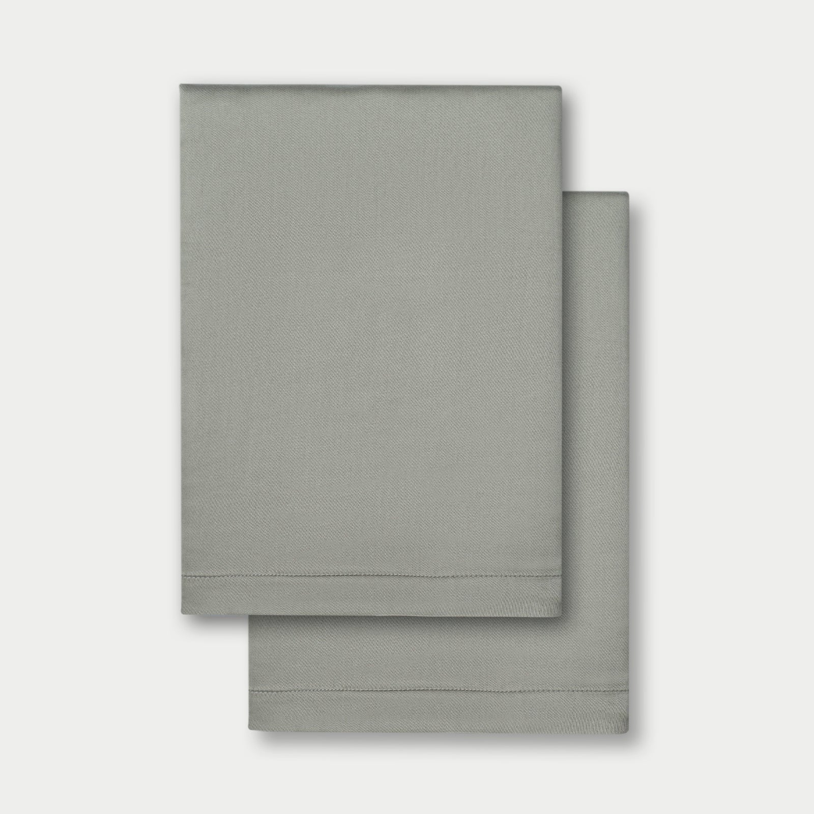 Flat lay of two pillowcases in sage standard/king/body