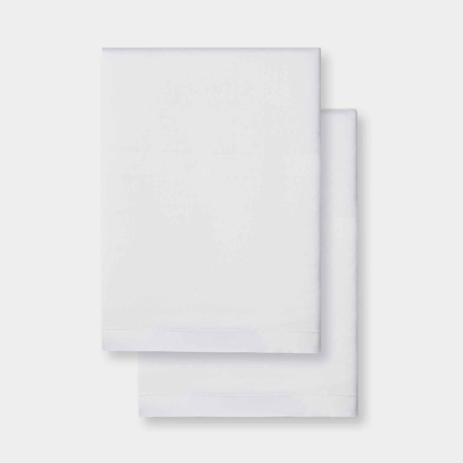 Flat lay of two standard/king pillowcases in white