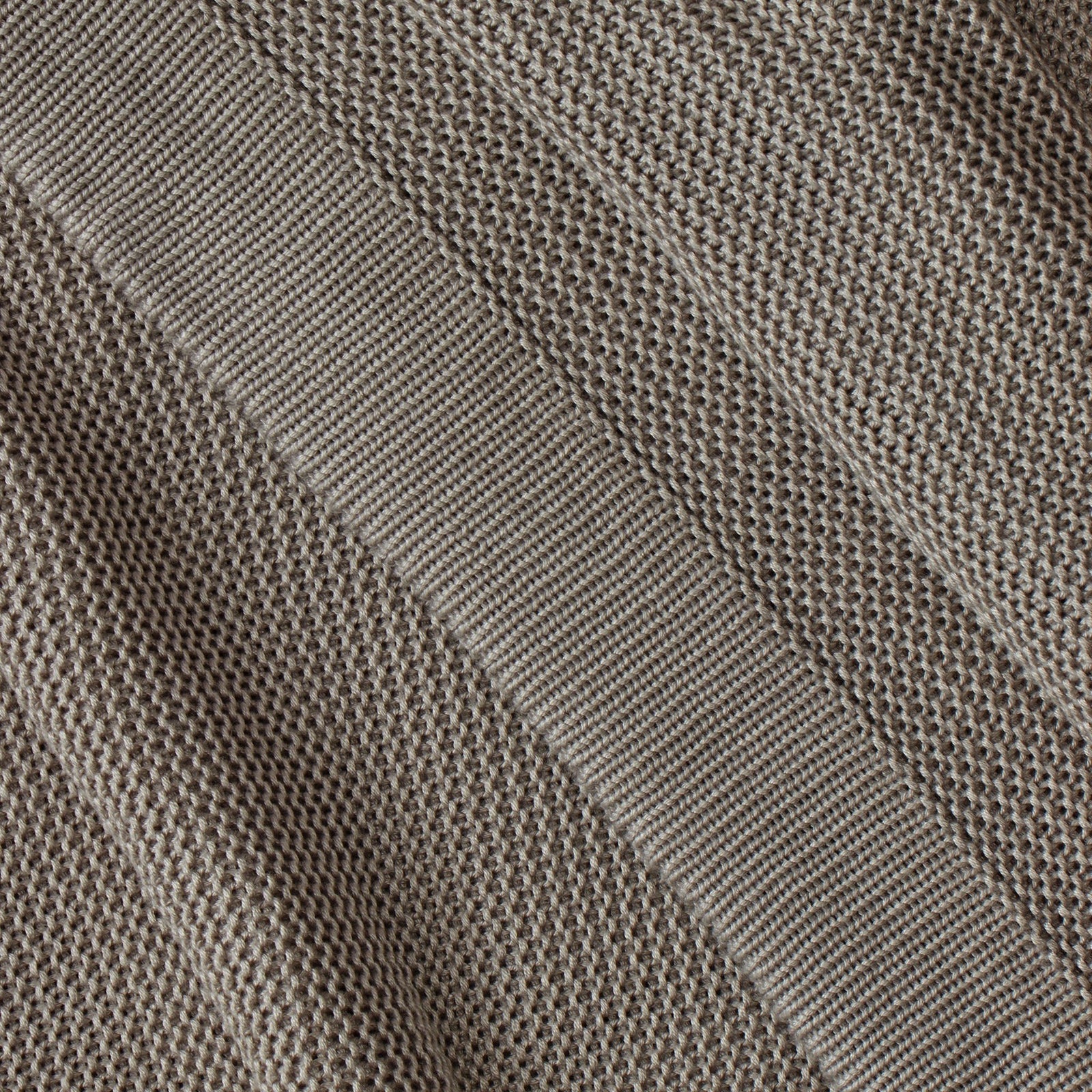 Close up of charcoal cloud knit blanket 