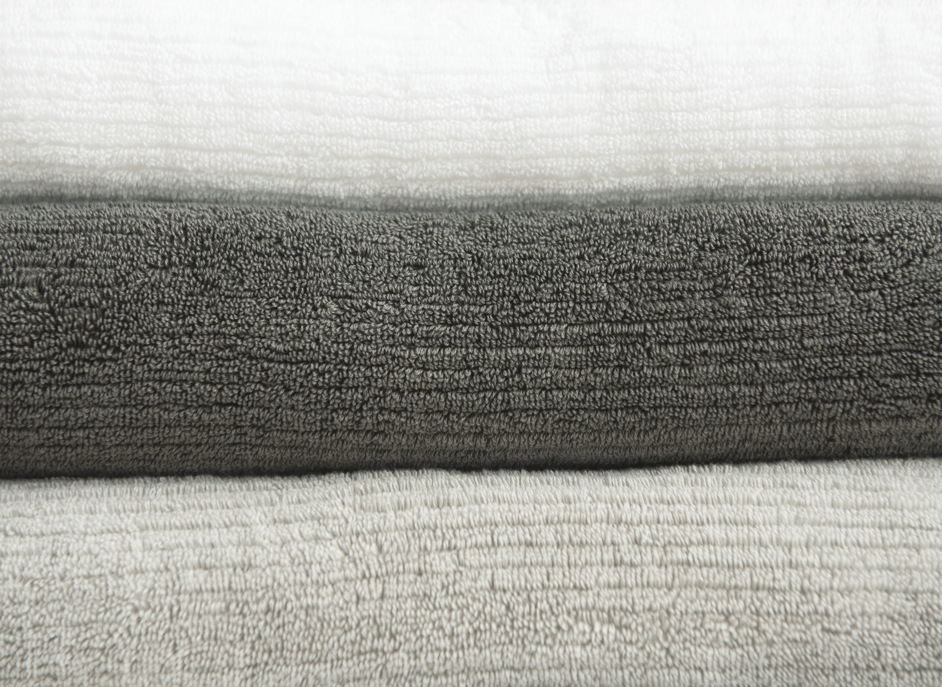 Ribbed Terry Bath Sheets in the color Charcoal Light Grey White. Photo taken close up only showing the towels.
