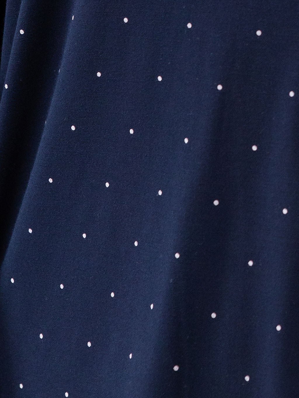 Mini Dot Short Sleeve Pajama Set. The photo was taken close up, showing off the print of the pajamas. 
