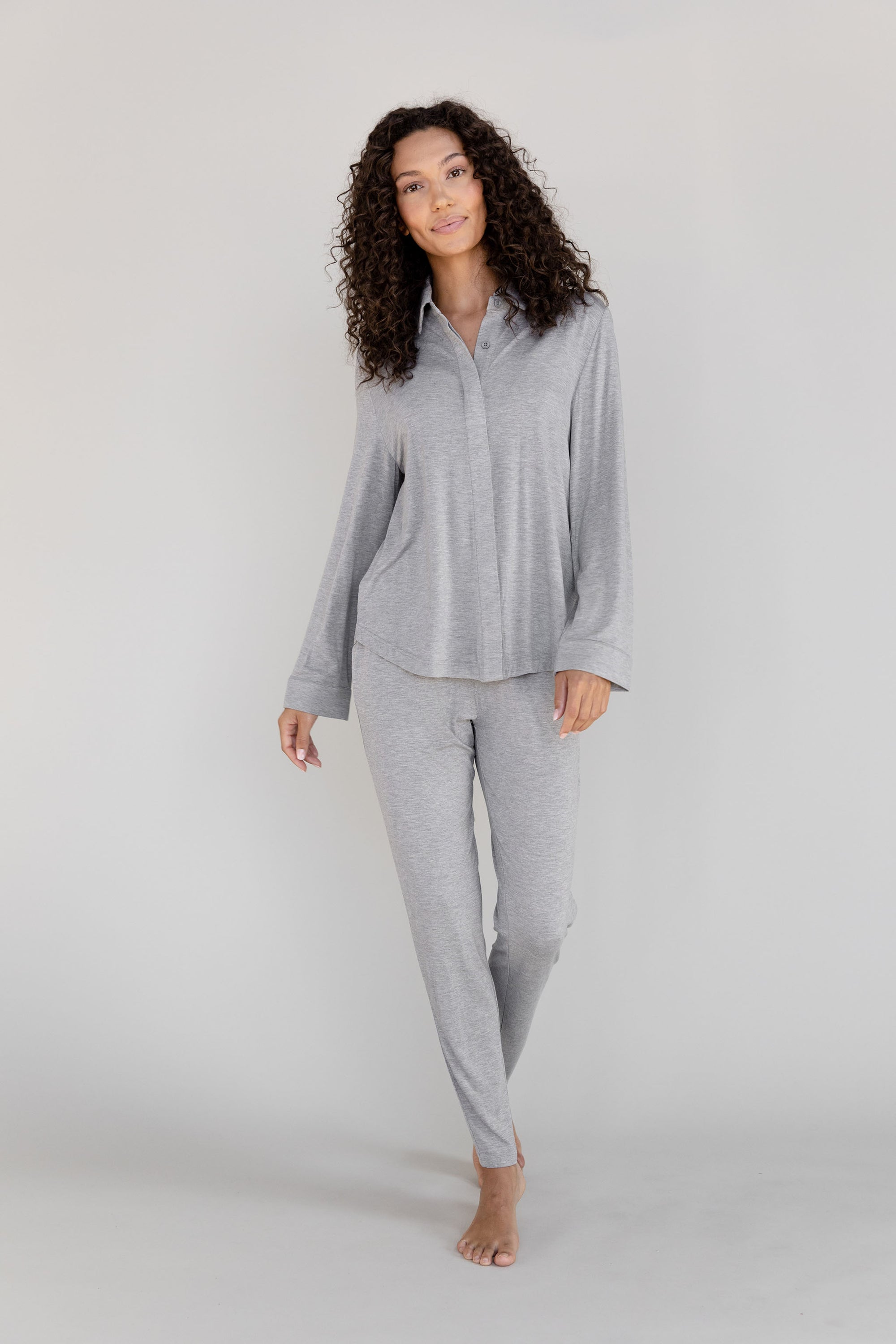 Gray Cozy Earth Stretch Knit Tapered Pant set worn by a person on a light gray background 