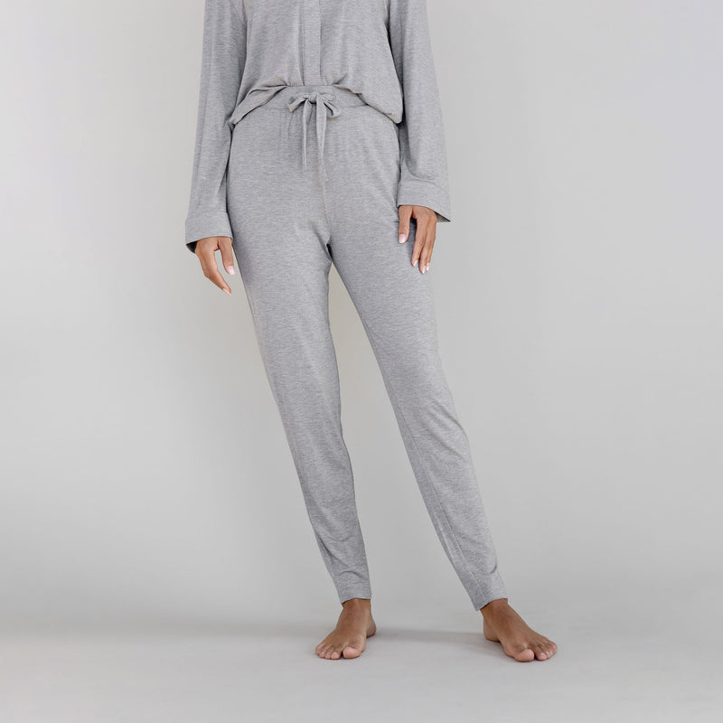 Gray pajama set worn by a person on a light gray background