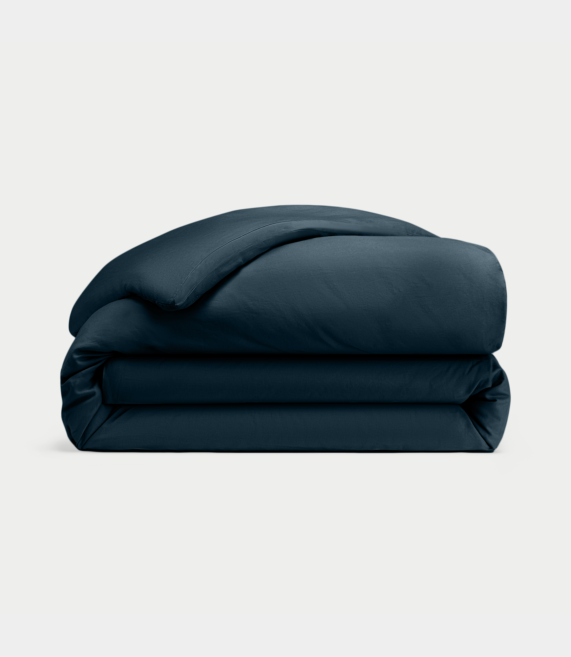 Navy Linen Duvet Cover neatly folded over white background. |Color: Navy