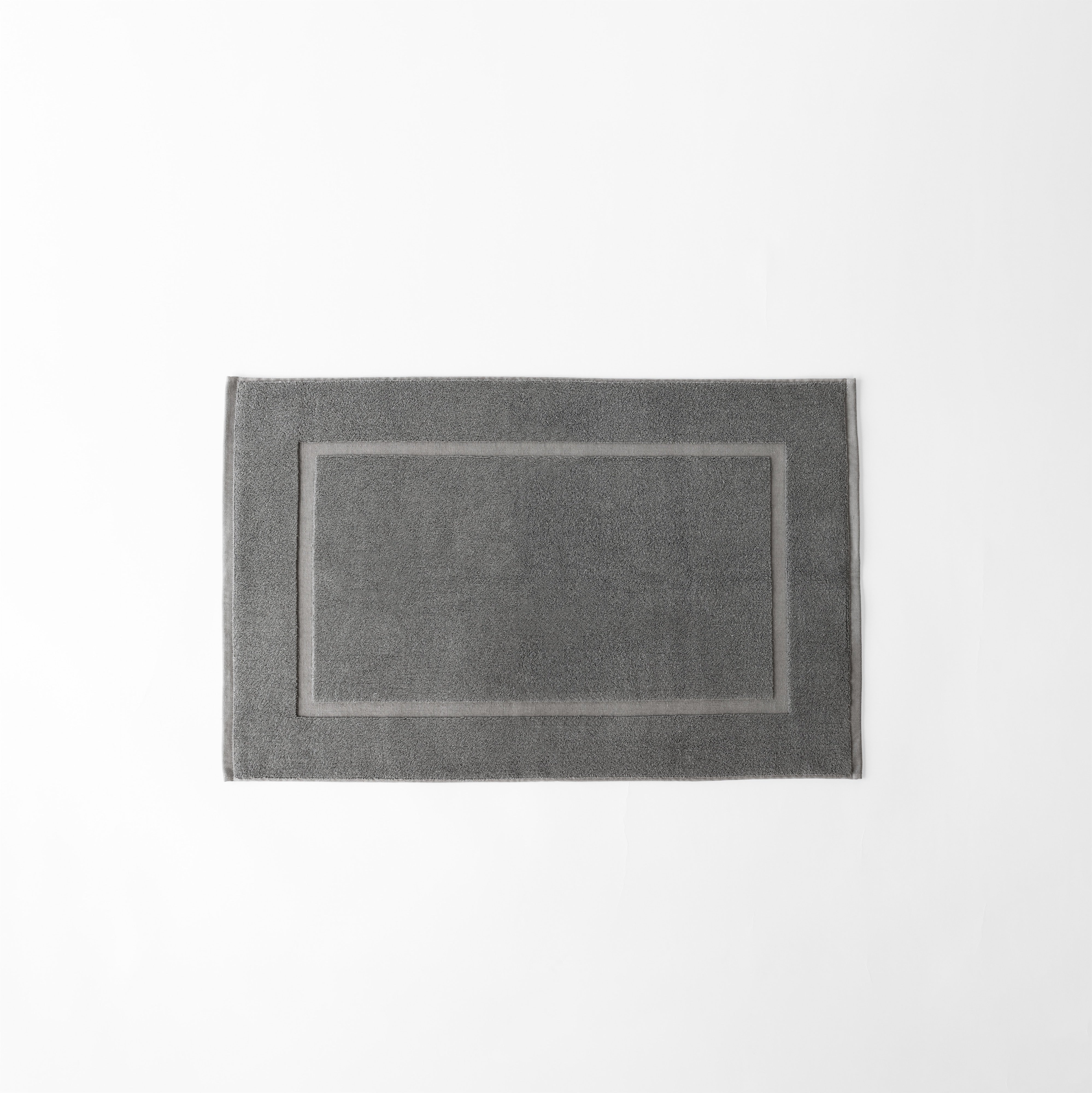 Charcoal Premium Plush Bath Mat resting on white background.|Color:Charcoal