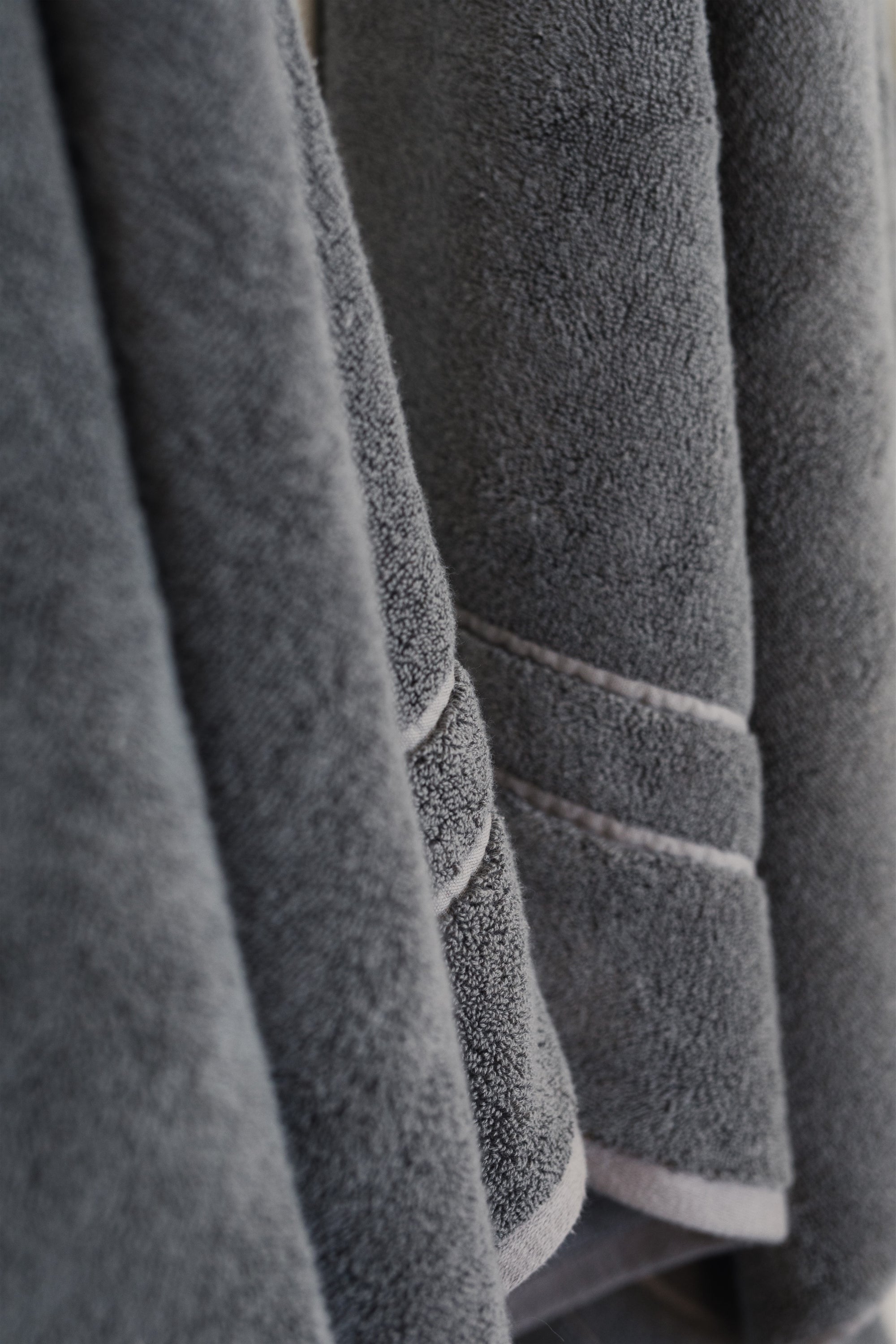 Premium Plush Bath Sheet in the color Charcoal. Photo of Charcoal Premium Plush Bath Sheet taken as a close up of the Premium Plush Bath Sheet. 