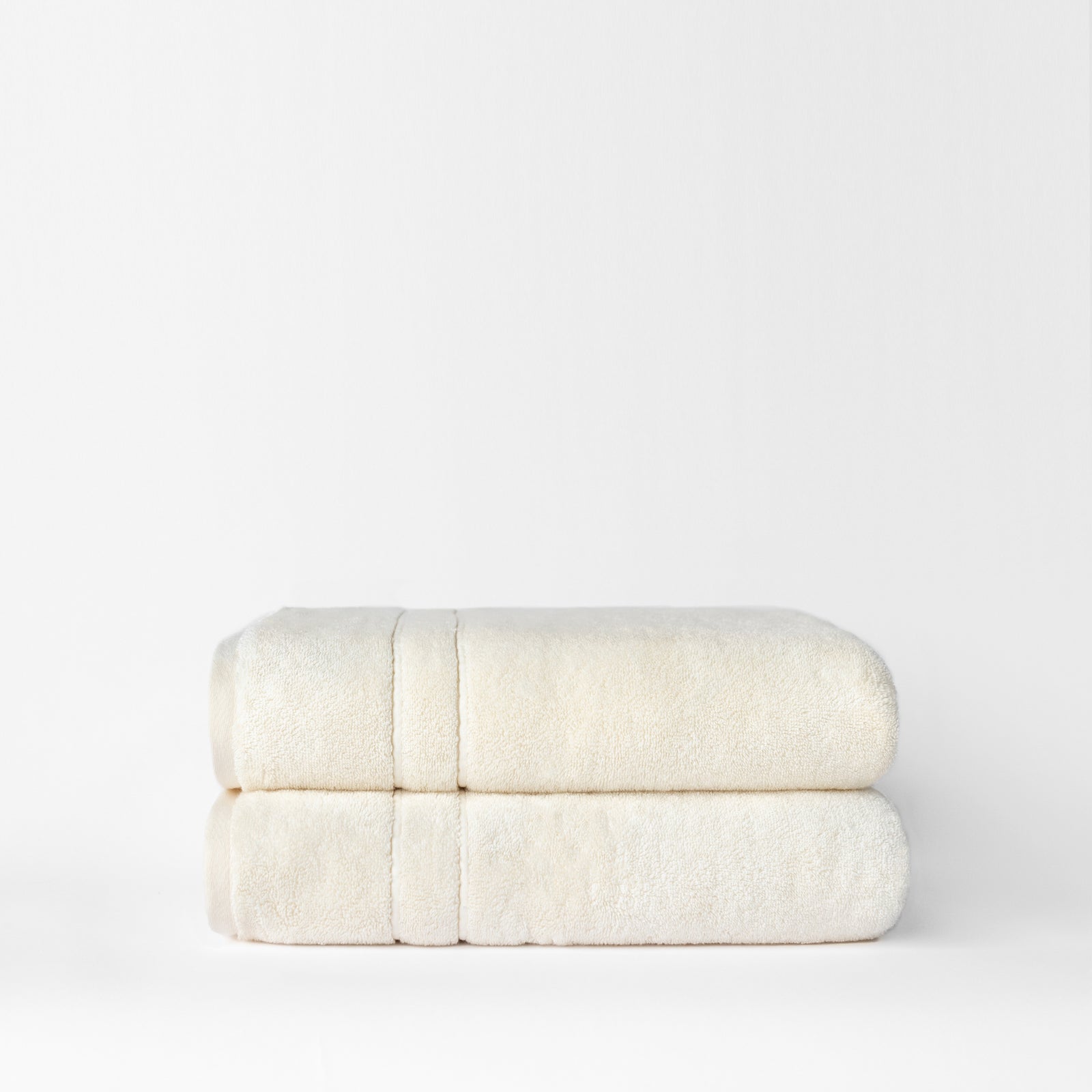 Premium Plush Bath Towels in the color Creme. Photo of Complete Premium Plush Bath Bundle taken with white background 