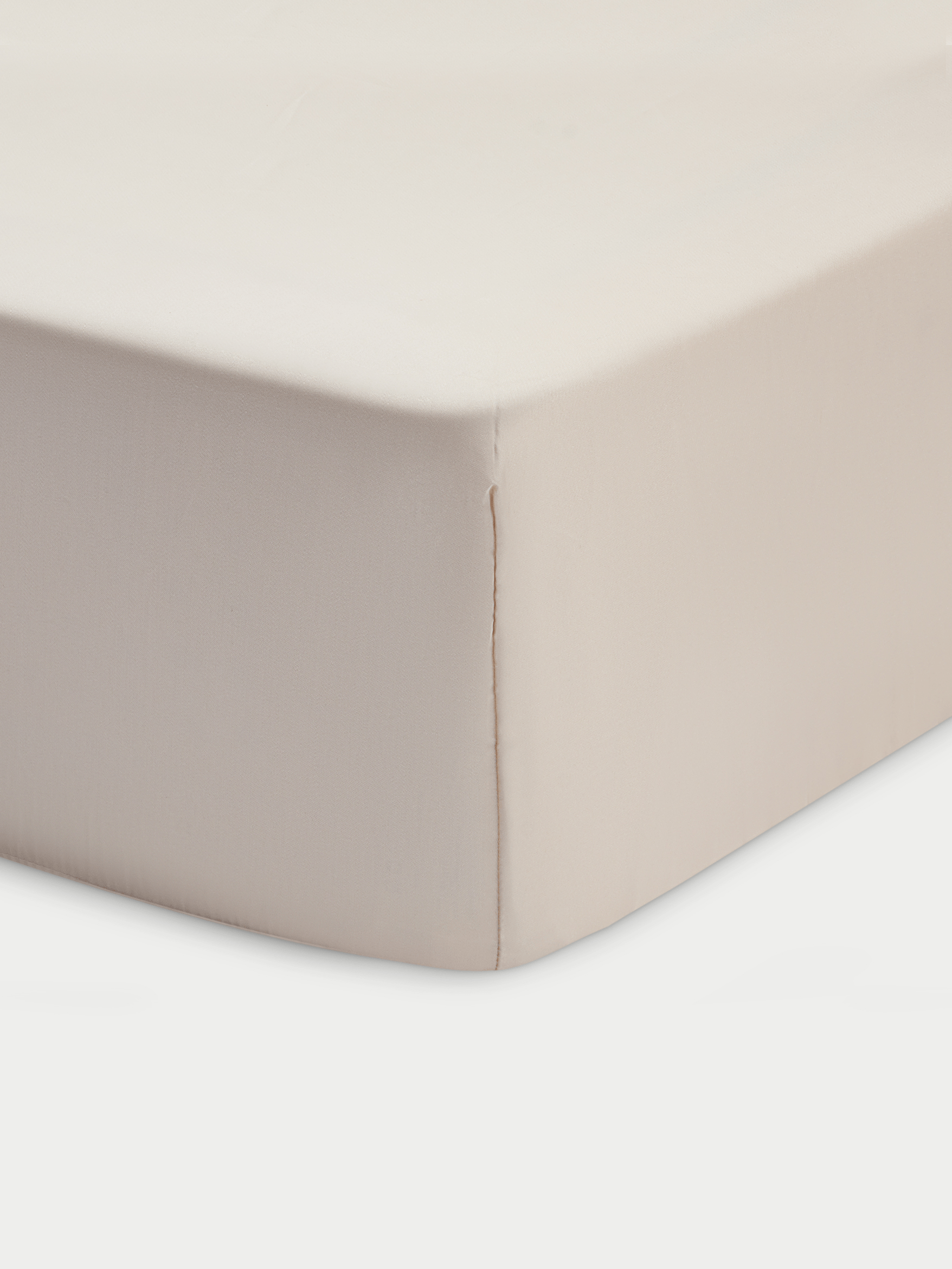 Corner of driftwood crib sheet with white background 