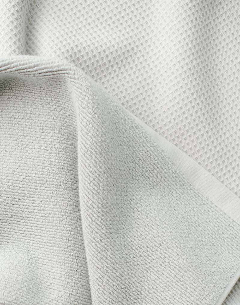 Waffle Bath Towel in the color Harbor Mist. Photo of Harbor Mist Waffle Bath Towel taken as a close up of the Waffle Bath Towel. The picture shows only the towel