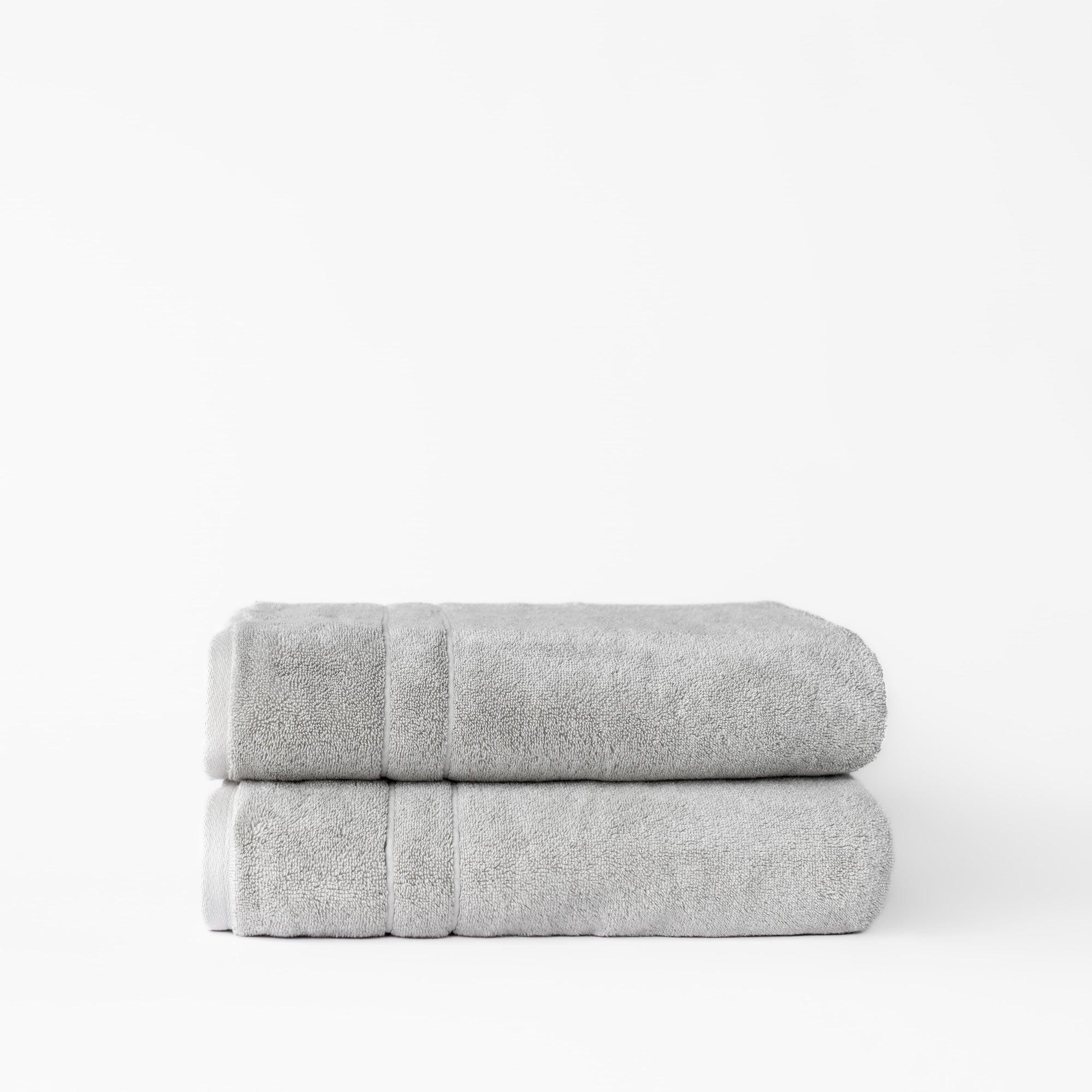 Premium Plush Bath Towels in the color Light Grey. Photo of Complete Premium Plush Bath Bundle taken with white background 