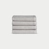 Light Grey Waffle Wash Cloths neatly folded. The photo was taken with a white background. |Color:Light Grey