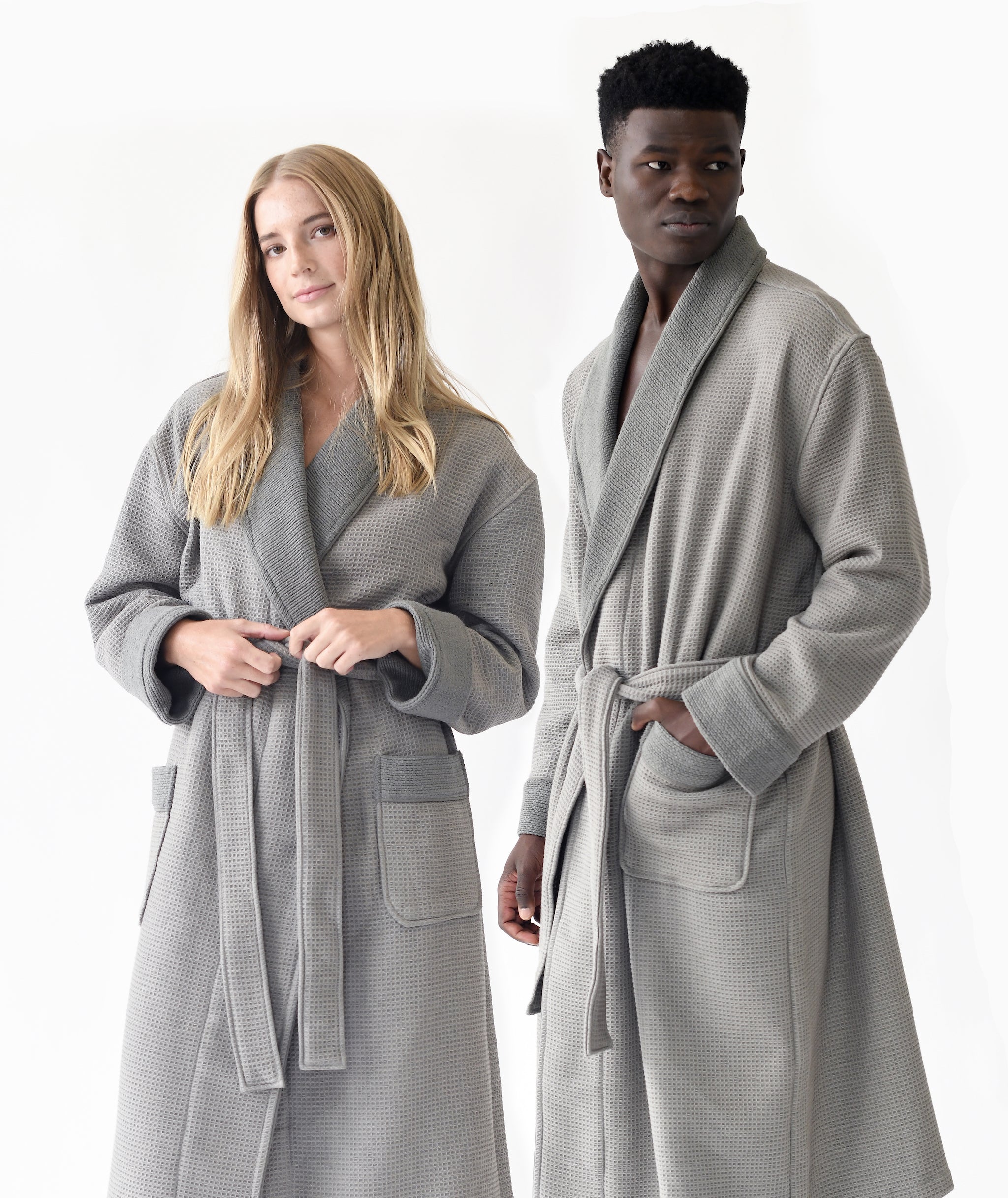  Man and woman standing in front of white background. both the man and the woman are wearing charcoal bamboo waffle knit robes. |Color:Charcoal