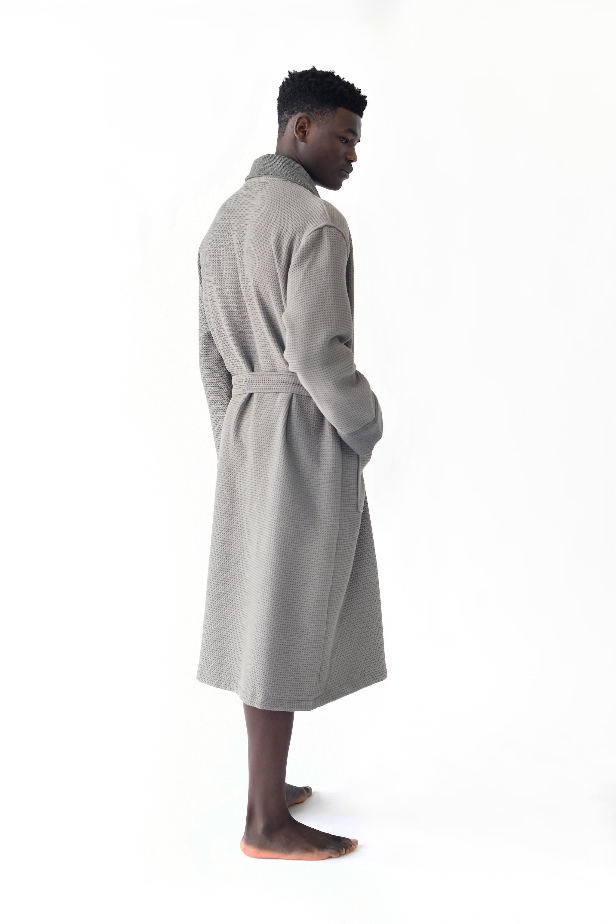 Man wearing Bamboo Waffle Bath robe standing in front of a with a white background. |Color:Charcoal