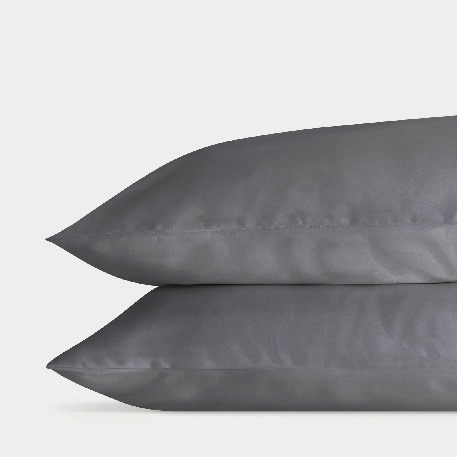 Two charcoal pillowcases with white background 