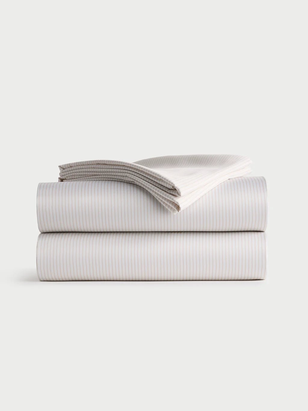 Stack of light striped sheets neatly folded.