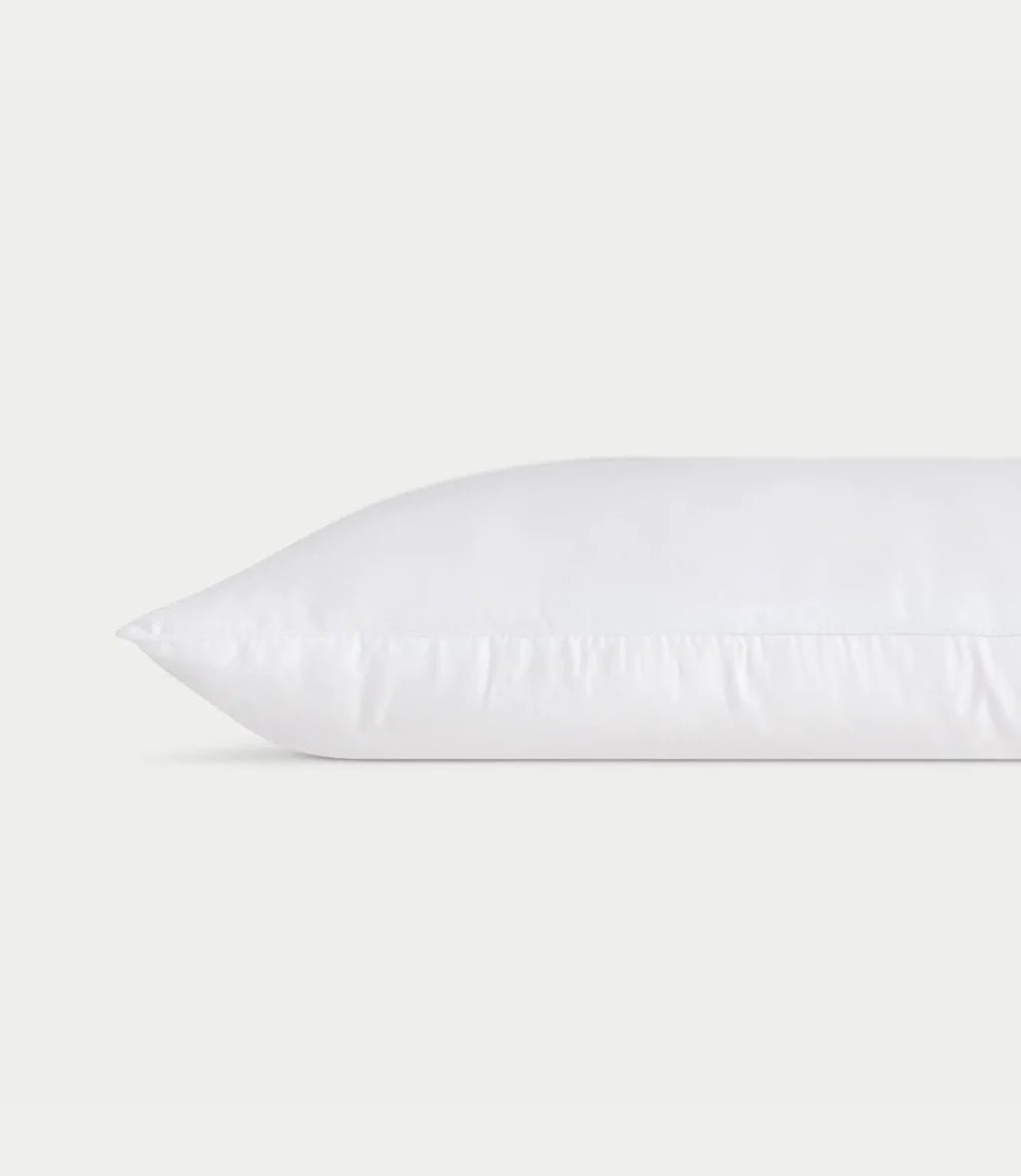 White pillow against a plain light background.